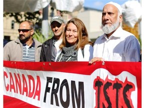 Christianne Boudreau, left and Imam Syed Soharwardy during the multi-faith rally against terrorism at City Hall in Calgary on September 13, 2014.