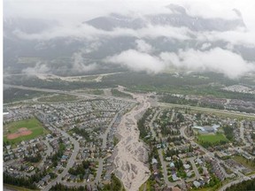Cougar Creek rips through Canmore, Alta. during heavy flooding in June, 2013.
