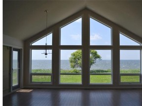 Courtesy Sunset Acres The lake is visible through large windows in a homes at Sunset Acres.