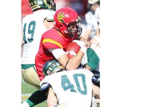 &amplt;aic:cstyle name =&ampquot;[Dinos receiver Rashaun Simonise holds onto the ball while Rams Dylan Minshull brings him down. The University of Calgary Dinos football team played host to the Regina Rams on October 4, 2014 winning 59-7 at McMahon Stadium. 
 Dinos receiver Rashaun Simonise holds onto the ball while Rams Dylan Minshull brings him down. The University of Calgary Dinos football team played host to the Regina Rams on October 4, 2014 winning 59-7 at McMahon Stadium.
