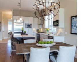 The dining nook and kitchen in a show home at the Villas of Watermark are full of bright colours. The kitchen features quartz counters, soft-close cabinets and drawers and a full-height stone or porcelain backsplash. Courtesy, Watermark at Bearspaw