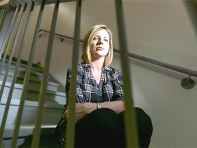 Doreen Stewart, a new Calgarian, was forced to take 14 flights of dark stairs to get her dark apartment after power outages left the west end of downtown Calgary in the dark.