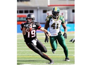 Eskimos defensive end Odell Willis tries chasing down Stampeders quarterback Bo Levi Mitchell during the Labour Day Classic at McMahon Stadium. The Eskimos defence is looking to rebound from that 28-13 loss.