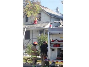 Firefighters were fighting a house fire 10 hours after it started on Saturday, September 6, 2014 in the 900 block of 8th Ave. S.E. in Inglewood.