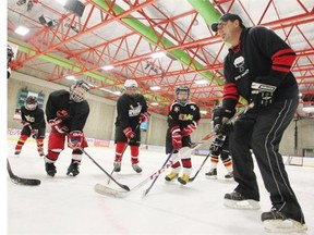 Former NHL player Bob Wilkie worked with 9- and 10-year-old hockey players during a clinic at the Joseph Kryczka Arena in Calgary last week. He is playing in The Extraordinaires Golf Classic on Wednesday at Blue Devil Golf Club in support of Alzheimer’s.