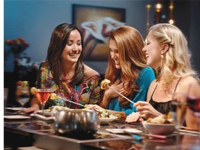 Girls night out at The Melting Pot restaurant in the United States, which is seeking expansion into the Calgary market.