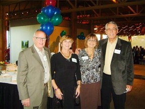 Greg and Joanne Martin, left, along with Glen and Jeanette Richardson,­ came out for the fundraising party.