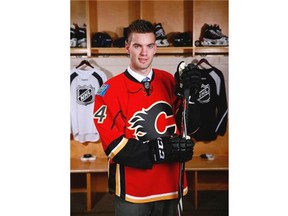 Hunter Smith, the 54th overall pick of the Calgary Flames, poses for a portrait during the 2014 NHL Entry Draft at Wells Fargo Center in June in Philadelphia.