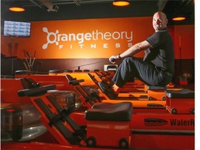 iCrystal Schick/ Calgary Herald 
 CALGARY, AB — Michael McDonald, owner, uses a water rowing machine at Orangetheory Fitness on Symons Valley Road in northwest Calgary, on October 21, 2014. -- 
 (Crystal Schick/Calgary Herald) (For Lifestyle story by Meghan Jessiman) 
 00059763A
