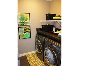 The laundry room in the Hogan show home by Pacesetter by Sterling Homes in Evanston. Andrea Cox for the Calgary Herald.