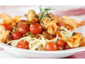 Linguine with butterfly shrimp in white wine with spicy cherry tomato sauce at the Manchester restaurant Bottega Trattoria Tuesday October 14, 2014.