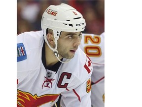 Mark Giordano had a two-point night in Calgary’s 2013-14 season opener in Washington.