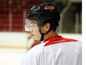 Mason Raymond waits his turn during a drill at Calgary Flames practice on Monday.