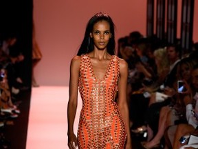 NEW YORK, NY - SEPTEMBER 06:  A model walks the runway at the Herve Leger By Max Azria fashion show during Mercedes-Benz Fashion Week Spring 2015 at The Theatre at Lincoln Center on September 6, 2014 in New York City.  (Photo by Frazer Harrison/Getty Images for Mercedes-Benz)