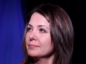 Wildrose Leader Danielle Smith speaks to media at her campaign office in Calgary on October 28, 2014.