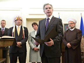 Jim Prentice gives an oath as he is sworn in as Alberta's 16th Premier in Edmonton, Alberta on Monday September 15.