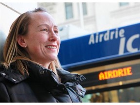 Airdrie resident Melanie Lacroix waits to get on the Airdrie ICE (Inter City Express) bus at 1st Avenue S.W. in downtown for the commute home.