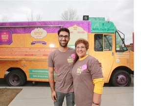Aman Adatia and his mom Nazma stand in front of Aman’s Naaco food truck in northwest Calgary on Friday March 16, 2014.