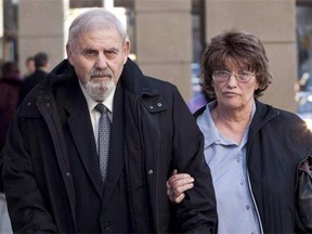 Former court-appointed psychiatrist Aubrey Levin, left, who is accused of sexually assaulting 10 of his patients, leaves court on Oct. 15, 2012 with his wife Erica.=