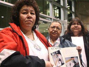Family members of murder victim Roy David, from left, sister Lorna David, mother Hilda David and sister-in-law- Madeline Desjarlais shortly after the guilty verdict was delivered against Michael Guignard and Alvin Waite in 2008