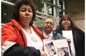 Family members of murder victim Roy David, from left, sister Lorna David, mother Hilda David and sister-in-law- Madeline Desjarlais shortly after the guilty verdict was delivered against Michael Guignard and Alvin Waite in 2008