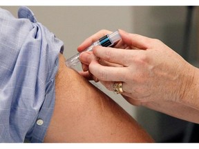 A man gets his flu shot. (Postmedia News files)