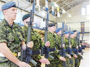 Soldiers practise Wednesday at the Regina Armoury for the opening of the Saskatchewan legislature. Reader says the deaths of two soldiers evoke memories of the IRA .