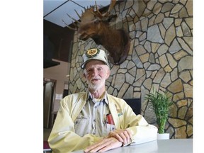 Les Picketts, Loyal Order of the Moose Lodge trustee, sits at a table in the main games and recreation area of the hall in Calgary, on September 25, 2014. Calgary’s only remaining Moose lodge is closing. (Crystal Schick/Calgary Herald)