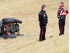 Police investigate the scene of a bizarre accident where an ATV that had been driving northbound on Deerfoot Trail crashed down an embankment at the Southland Drive interchange on Sunday afternoon. One person was taken to hospital in serious condition.