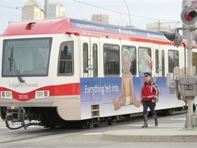 Police investigate the scene of a Ctrain-pedestrian collision at 25 Avenue S.E.