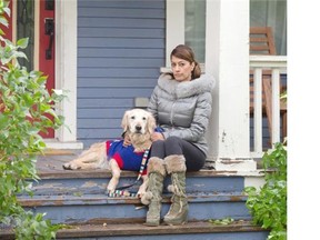 Prem Singh and her dog, Casey, have been without power at her home since Wednesday, after this week’s snowstorm snapped tree limbs and downed power lines across the city.