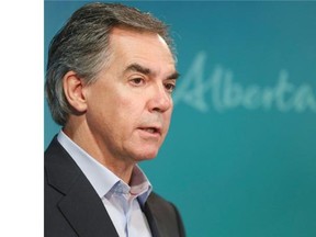 Premier Jim Prentice says it may be appropriate for workers in large, more corporate-type farming operations to be protected under labour legislation.