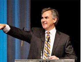 Jim Prentice celebrates his win following the results of the Progressive Conservative leadership first ballot in Edmonton on Saturday, Sept. 6, 2014. THE CANADIAN PRESS/Jason Franson