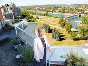 Realtor Rachelle Starnes, of Royal LePage Foothills, on the patio of a penthouse in the Princeton Hall highrise building in Eau Claire which she sold earlier this year for a record $4.4 million - the highest ever for a condo in the city’s resale market.