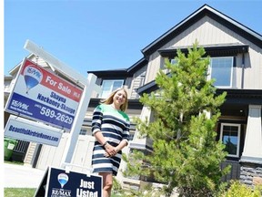 Realtor Shayna Nackoney-Skauge with RE/MAX Rocky View Real Estate outside one of her listings earlier this year.