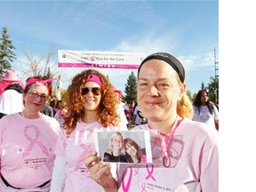 Robin Rosewood, Sherry Smith and Jennifer McCrea, all cancer survivors, run the 23rd annual Canadian Breast Cancer Foundation CIBC Run for the Cure at Southcentre Mall, in Calgary on October 5, 2014.