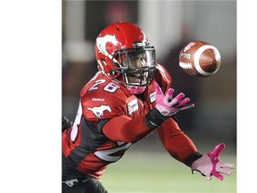 Stampeders defensive back Brandon Smith comes up with an interception in the fourth quarter as Calgary knocked of the Saskatchewan Roughriders 40-27 at McMahon Stadium Friday night.