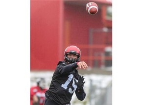 Stampeders quarterback Bo Levi Mitchell throws during a cold, snowy practice in Calgary on Tuesday. Calgary welcomes the Toronto Argonauts on Saturday (5 p.m., McMahon Stadium).