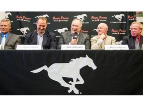 The Stamps are inducting six new members to their Wall of Fame on Saturday. They are Stu Laird, from left, Jamie Crysdale, Ron Allbright, Pat Clayton and George Hopkins, who were gathered at a news conference in May.