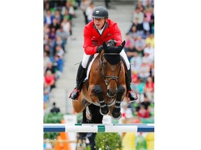 Switzerland’s Steve Guerdat rides Nino des Buissonnets during the team and individual qualifying show jumping event at the FEI World Equestrian Games in Caen, western France last week.