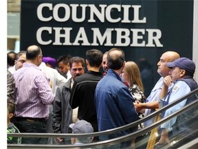 Taxi drivers congregated in the lobby at City Hall before public presentations to the Standing Policy Committee on community and protective services about adding hundreds of taxi new licences in the city.