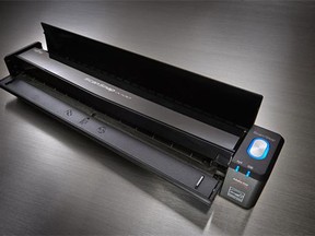Weighing less than a pound, the ScanSnap iX100 is a portable scanner that is able to go through documents, receipts and business cards with great accuracy and efficiency.