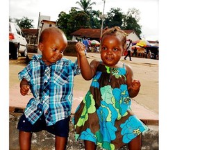 Twins Leo and Grace in Sierra Leone in 2013. The Ebola outbreak in the region has crippled the country, and the twins´ adoptive parents, Kayt and Stefan Mahon, are struggling to obtain Sierra Leonean passports to bring their children home to Canada.