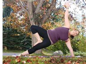 Yoga instructor Johanna Steinfeld demonstrates the Side Plank Tree pose .