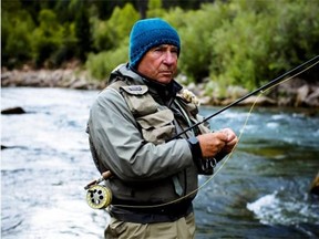 Yvon Chouinard checking the late evening rises on the Upper Gros Ventre River. Jackson, Wyoming.