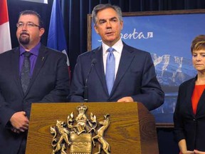 Alberta Premier Jim Prentice announces Monday that Wildrose MLAs Kerry Towle and Ian Donovan have crossed the floor to join the PC caucus.