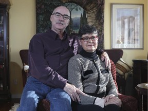 Marilyn Herasymowych, who has been diagnosed with cancer, sits with her husband and now, primary caregiver, Henry Senko in Calgary, on November 21, 2014. Marilyn says that Hospice Calgary has played a beneficial role in her cancer journey.