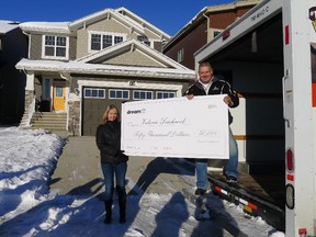 Valerie and George Teichroeb won $50,000 from Dream Development as part of the rebranding of the company's name from Dundee Developments. Valerie and her husband had recently bought a Homes by Avi home in EvansRidge.