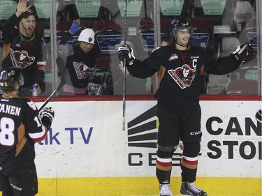 Calgary Hitmen's Kenton Helgesen celebrates his goal against the Swift Current Broncos at the Scotiabank Saddledome on Friday. The Hitmen won 6-4.