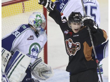 Calgary Hitmen Travis Sanheim  celebrates his goal against the Swift Current Broncos during Western Hockey League action at the Scotiabank Saddledome in Calgary, on November 28, 2014.